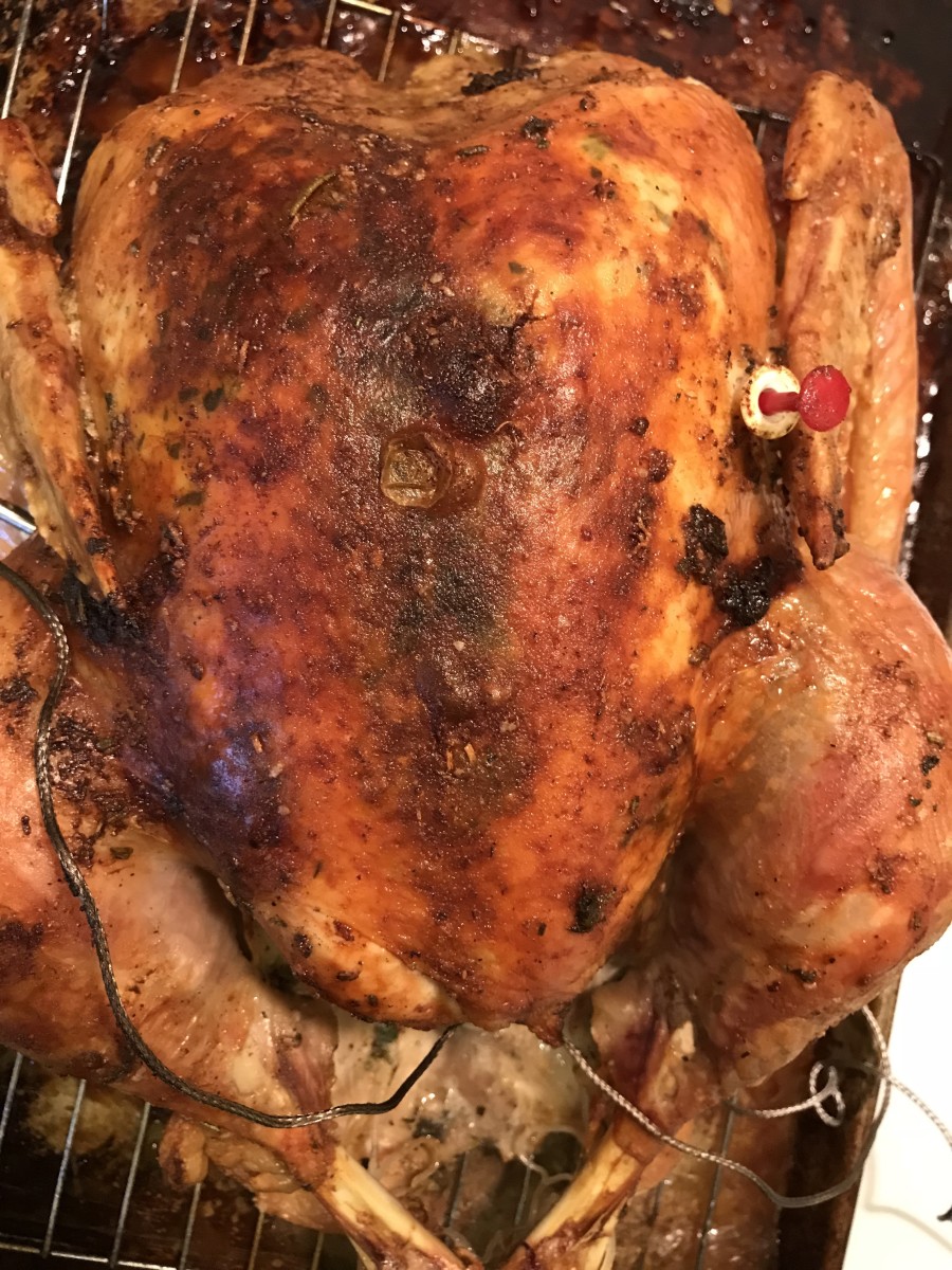 Once the temperature has reached 165F, remove the bird from the oven and allow it to rest for half an hour. Resting is important - so don't rush it. The juices will redistribute throughout the bird, and you'll have a juicier bird.