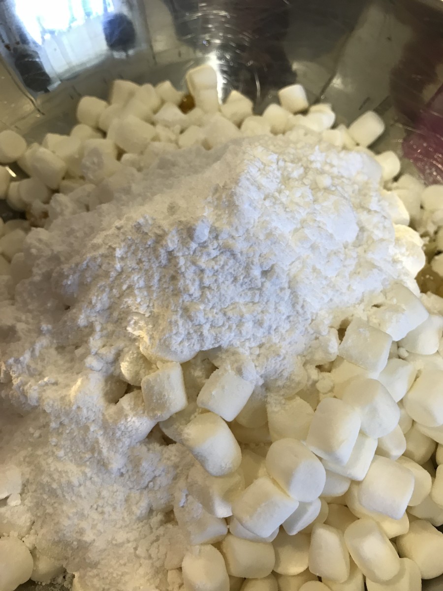 The reason this is really more a dessert than a salad - it falls in the traditional Southern category of sweetening everything. Add miniature marshmallows and powdered sugar.