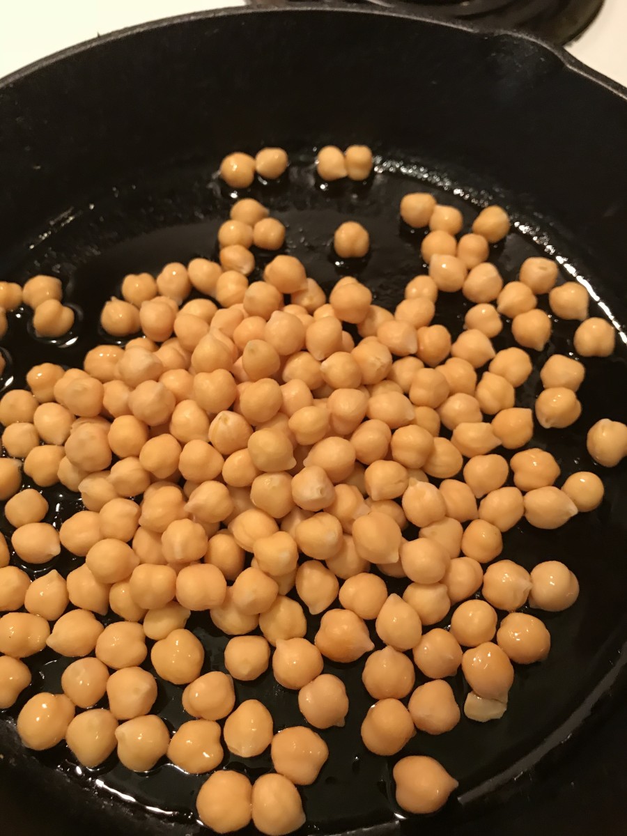 I use canned chickpeas - also sold as garbanzo beans. Drain them, rinse them and take a moment to dry them. The drier they are before cooking, the crispier they'll get. Wet ones will simply steam.