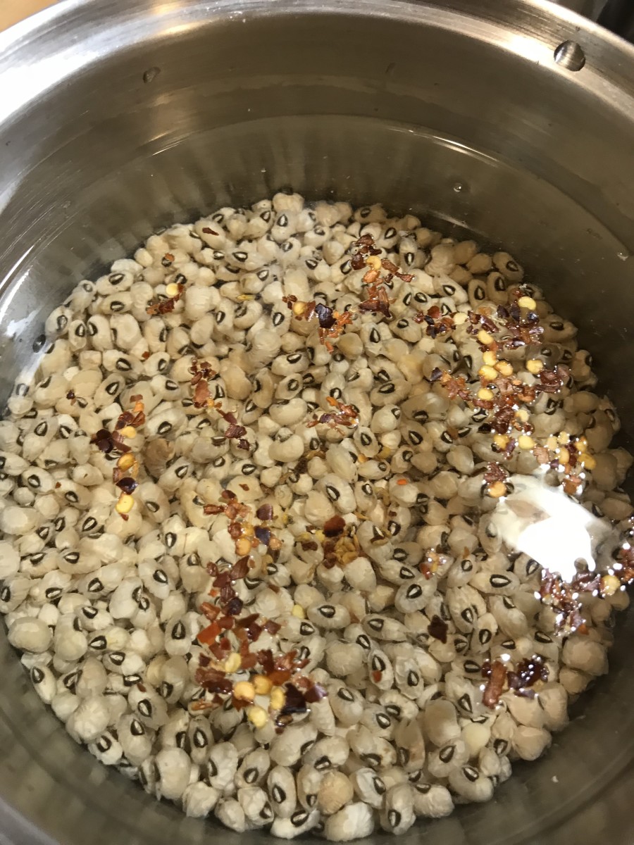 Add the salt and red pepper flakes. Black eyed peas are nice and mild—although distinctive—in flavor. You can add more red pepper or a hit of cayenne if you like. I tend to serve kiddos, so I keep the heat level low.