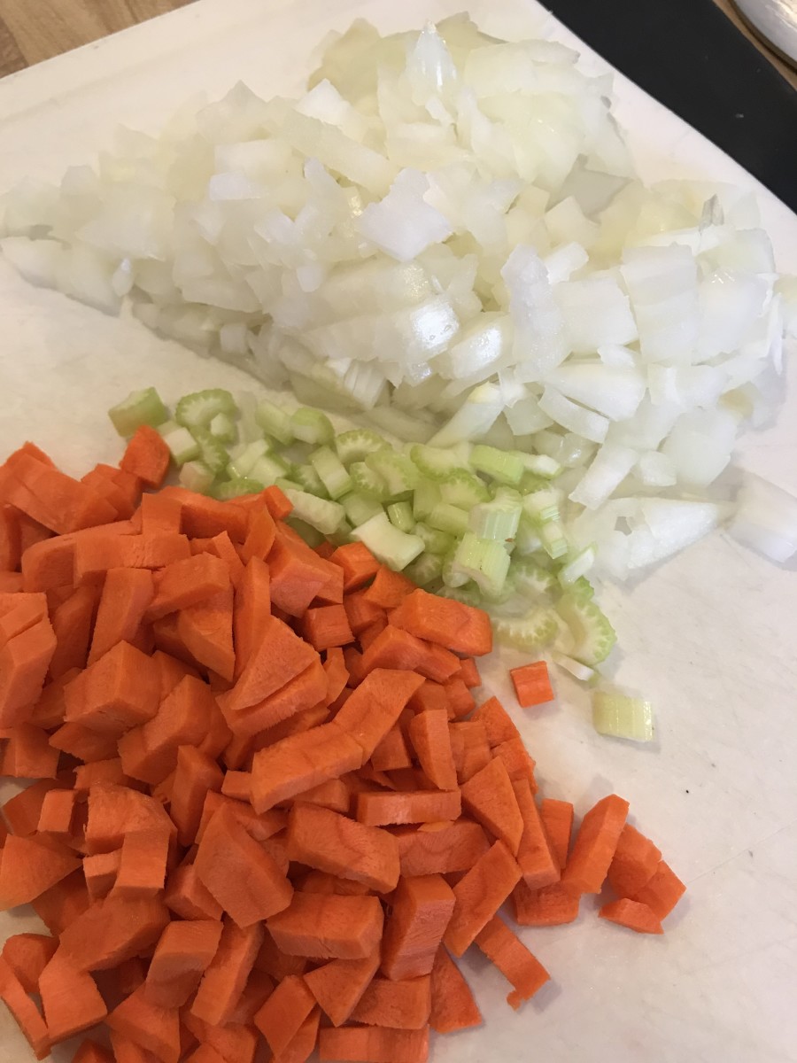 The veggies are simple - just 1/2 of an onion, a stalk of celery and a carrot. I like dicing the vegetables pretty small, I think the finished soup is just nicer, but cut them however you like it best.