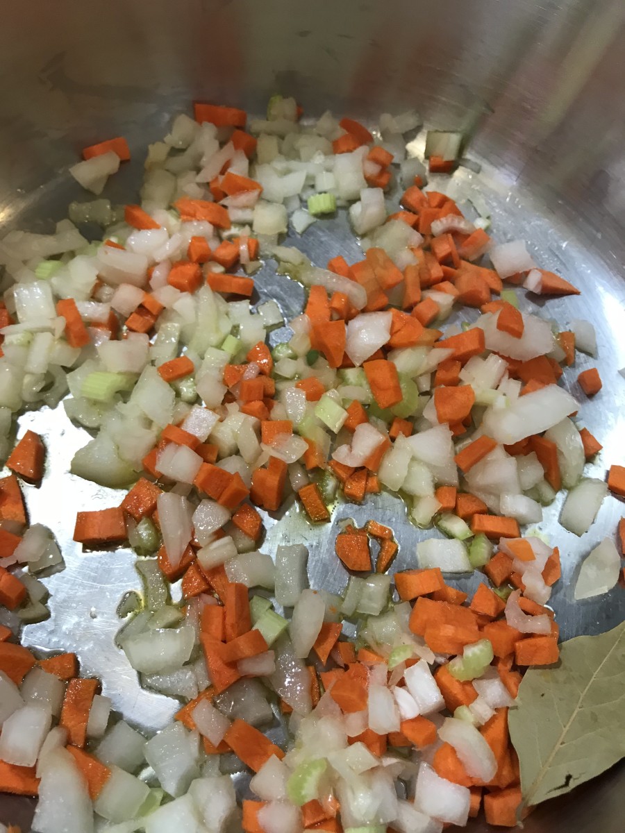 Because the soup simmers for about an hour and a half, don't worry too much about getting the vegetables and too tender here. Just long enough to wake up the flavors. They'll fully cook and soften as the soup simmers.