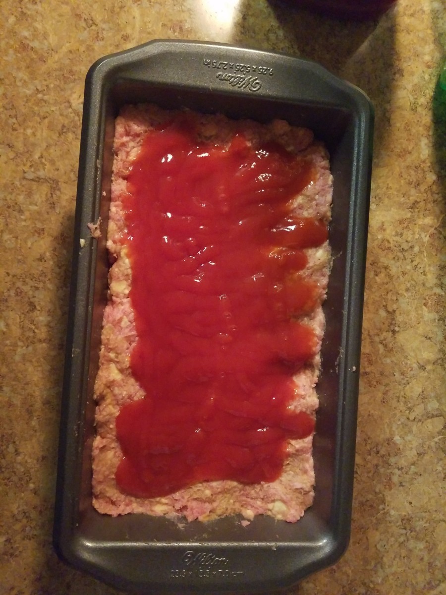 Squeeze ketchup on top in an even layer.