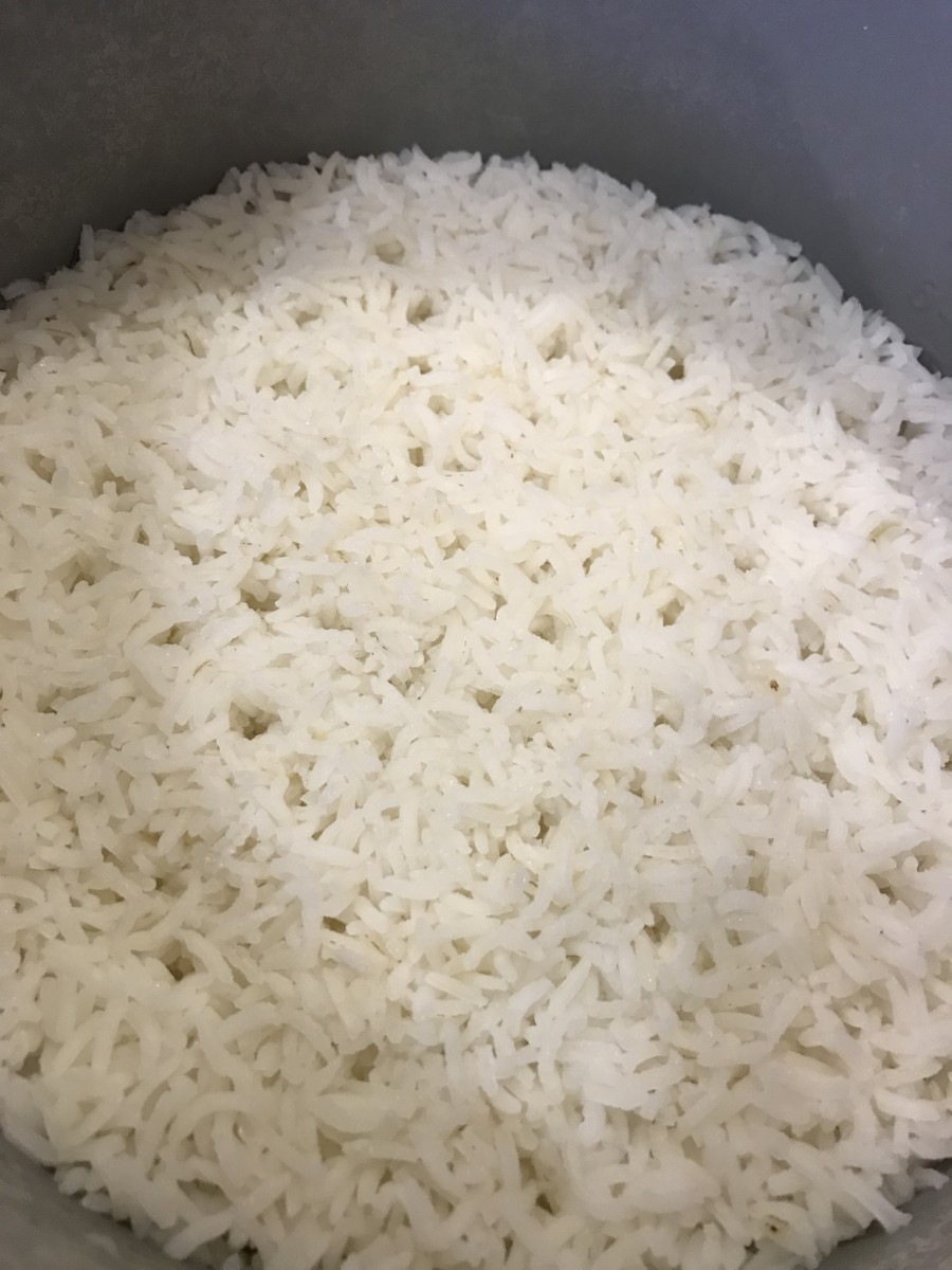 One of the keys to great, fluffy rice is to leave it alone while it cooks. Don't lift the lid, then fluff it with a fork when it's done.