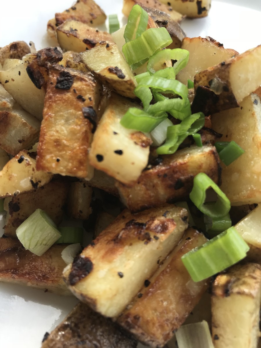 Just because it's beautiful - sprinkle the finished hash browns with a little minced green onions. The little bit of brightness from the scallions is the perfect finishing touch.