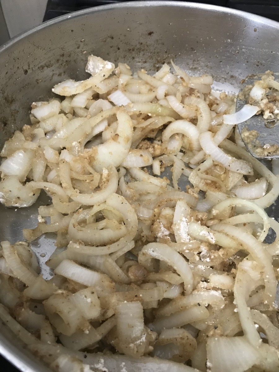 AS you cook the onions, make sure you scrape up the bits on the bottom of the pan. That's flavor! Once the onions have softened and become fragrant, sprinkle them with a couple of tablespoons of flour, stir well, and cook another couple of minutes.
