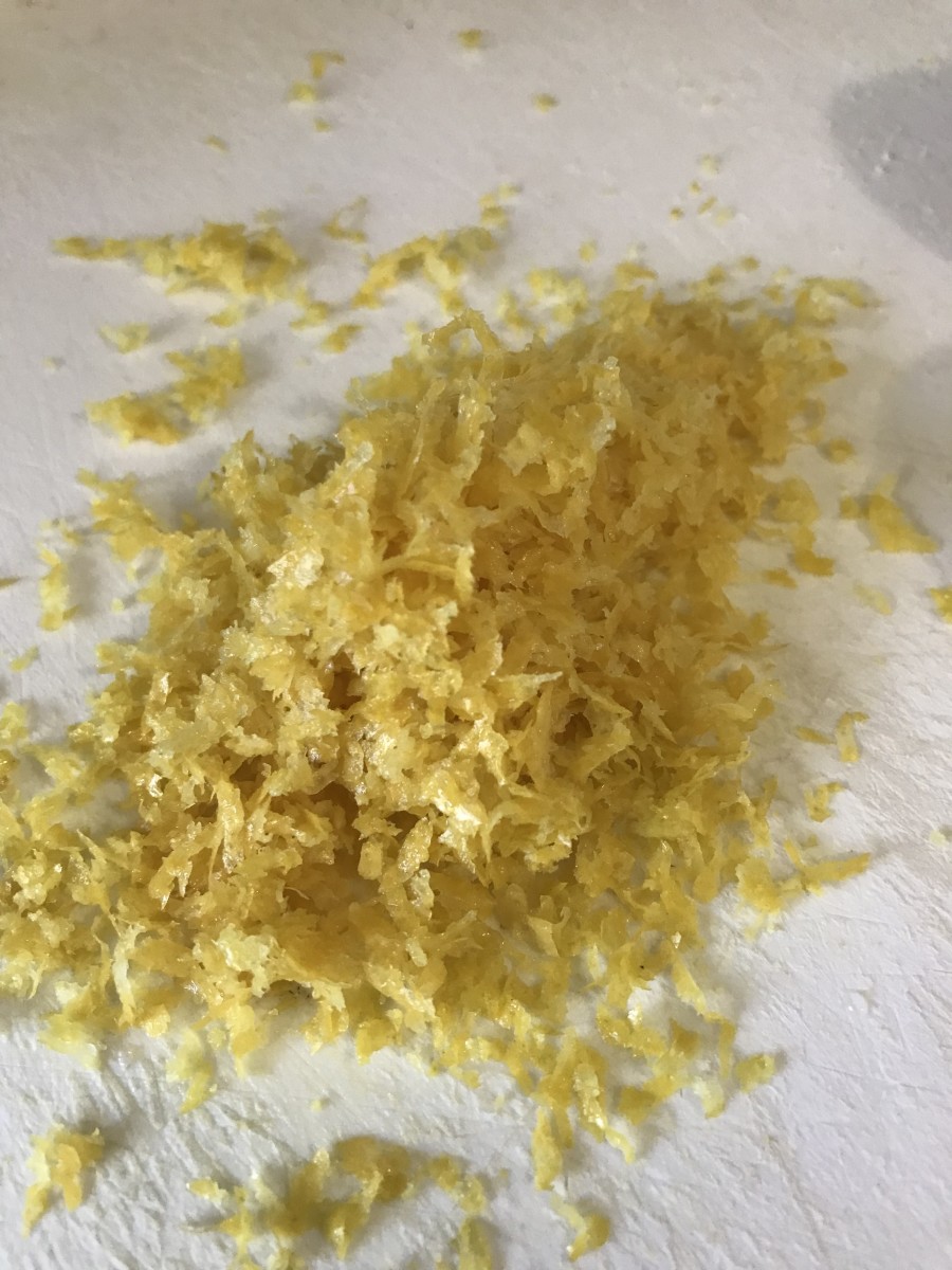 There really is no substitute for fresh lemon zest—the flavor just isn't there without it. Most of the flavor is in the citrus oils, which reside in the thin outside layer. You capture that glorious flavor with the zest!