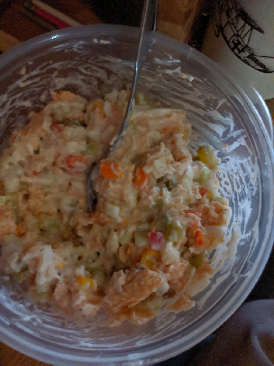 Salmon salad spread can be enjoyed with crackers, toast, or bagels.