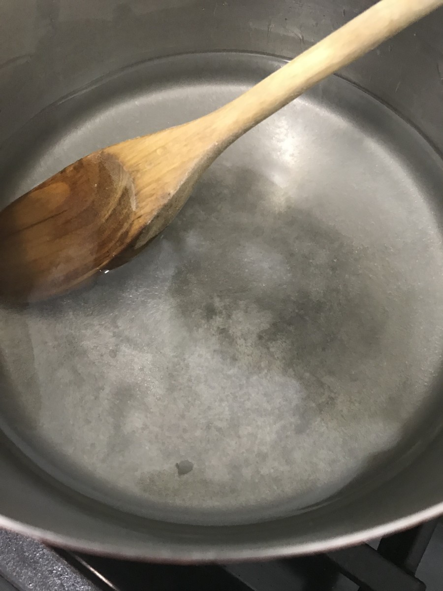 There's no real need to bring the simple syrup to a boil - all you really need is to dissolve the sugar. And the hotter you get it, the longer it will take to chill before serving. And who wants to wait any longer for treats than necessary?