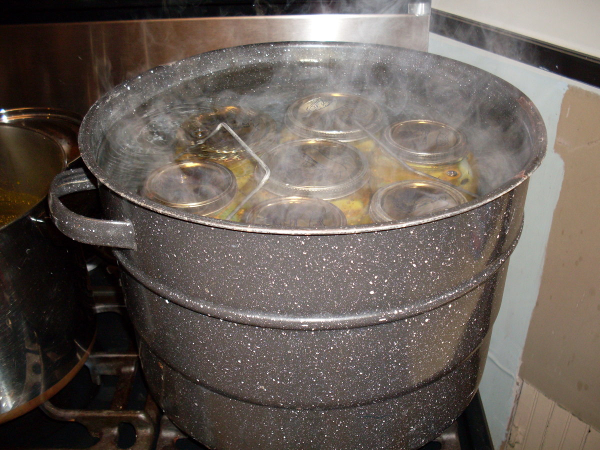 Place gently in boiling water in canner (water should cover jars by about 1 inch), replace lid, return to a full boil, and process 5 minutes.