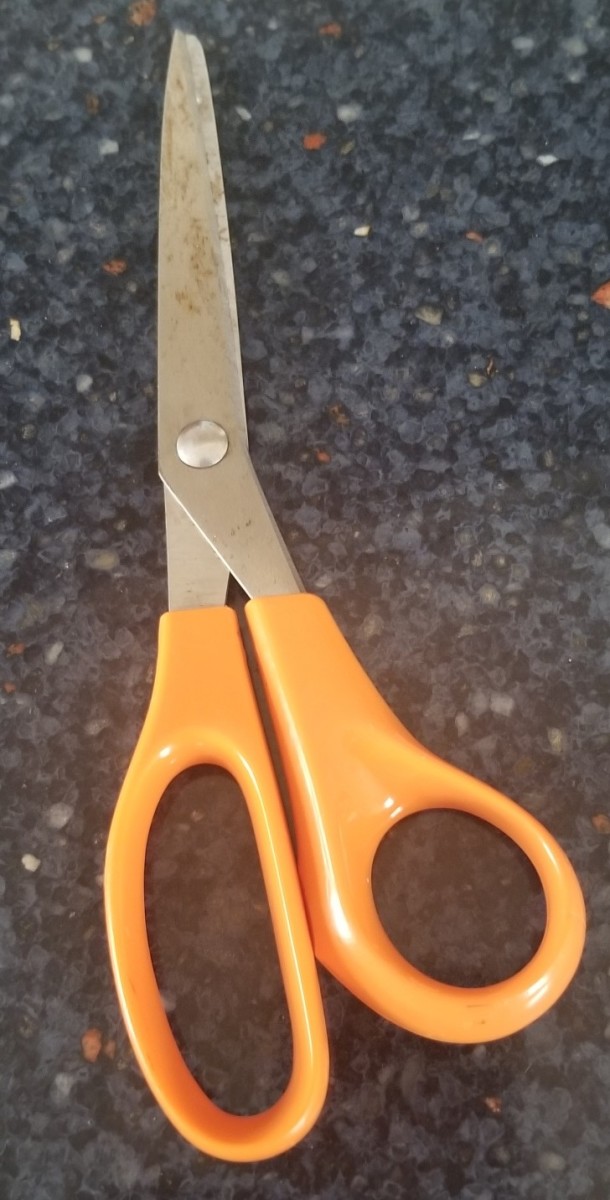 You never know when a pair of scissors will be handy for cutting a bandage in your car.