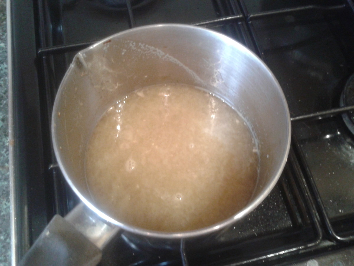 Lemon and grated ginger in a saucepan