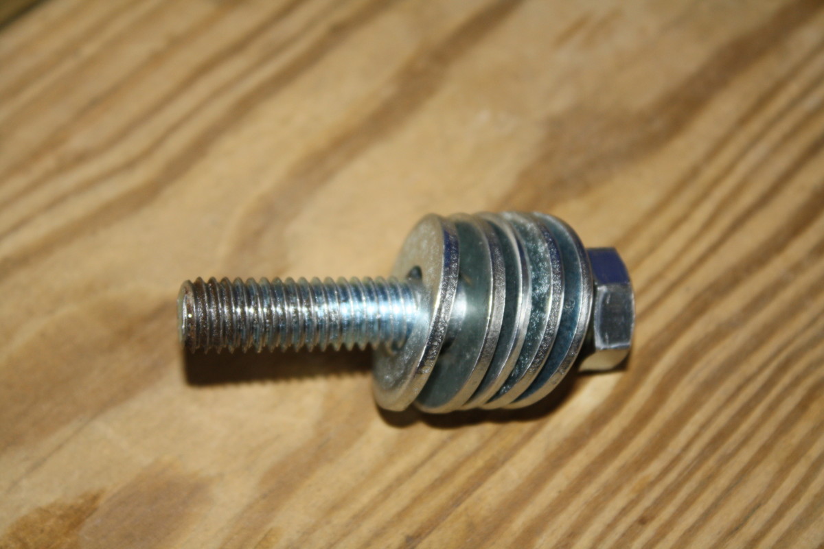 Pulley installation tool. A 2-inch x 3/16 x 16 (NC) bolt and five washers.