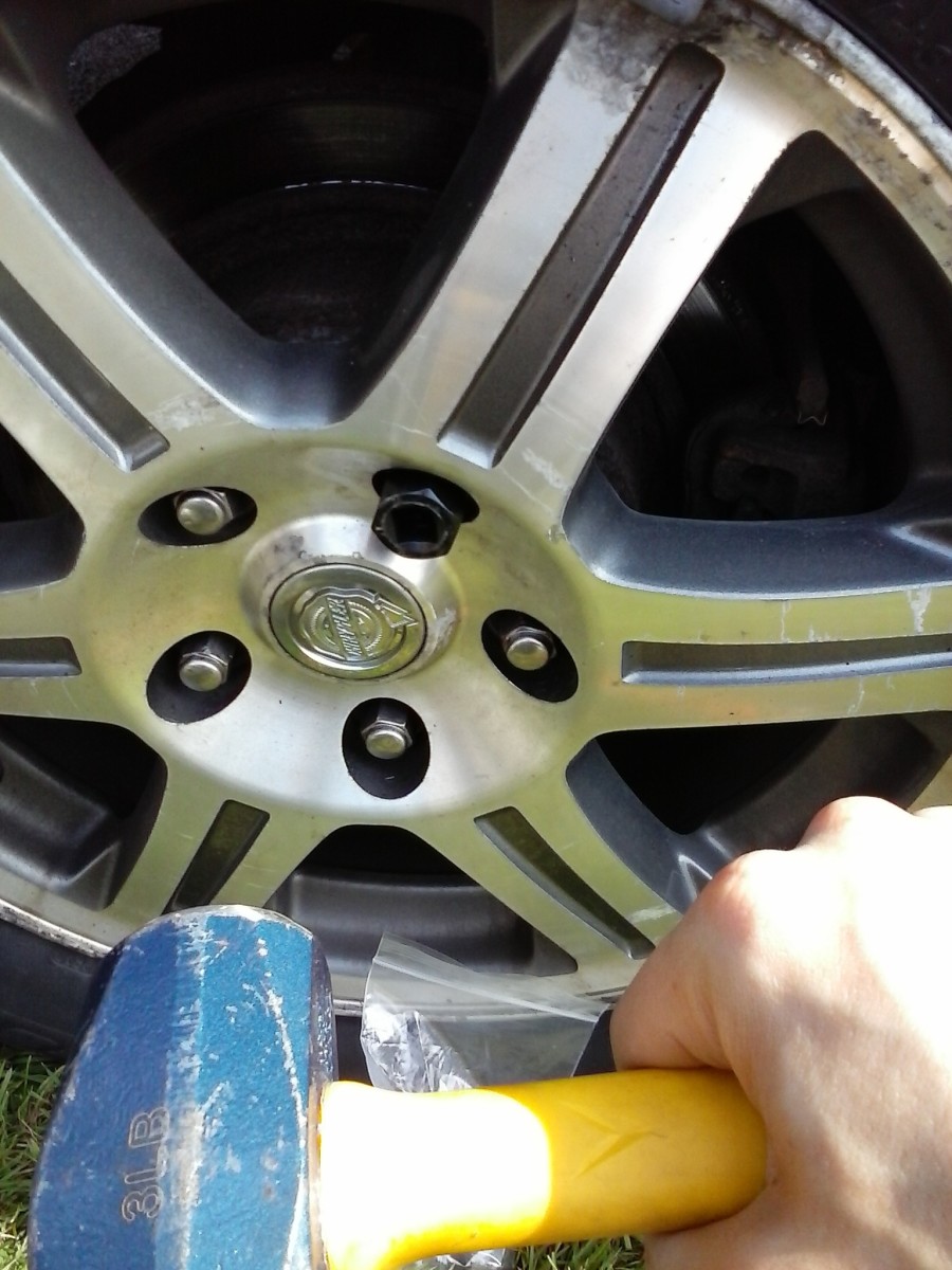 How To Remove Lug Nuts How to Remove a Stuck or Stripped Lug Nut - AxleAddict