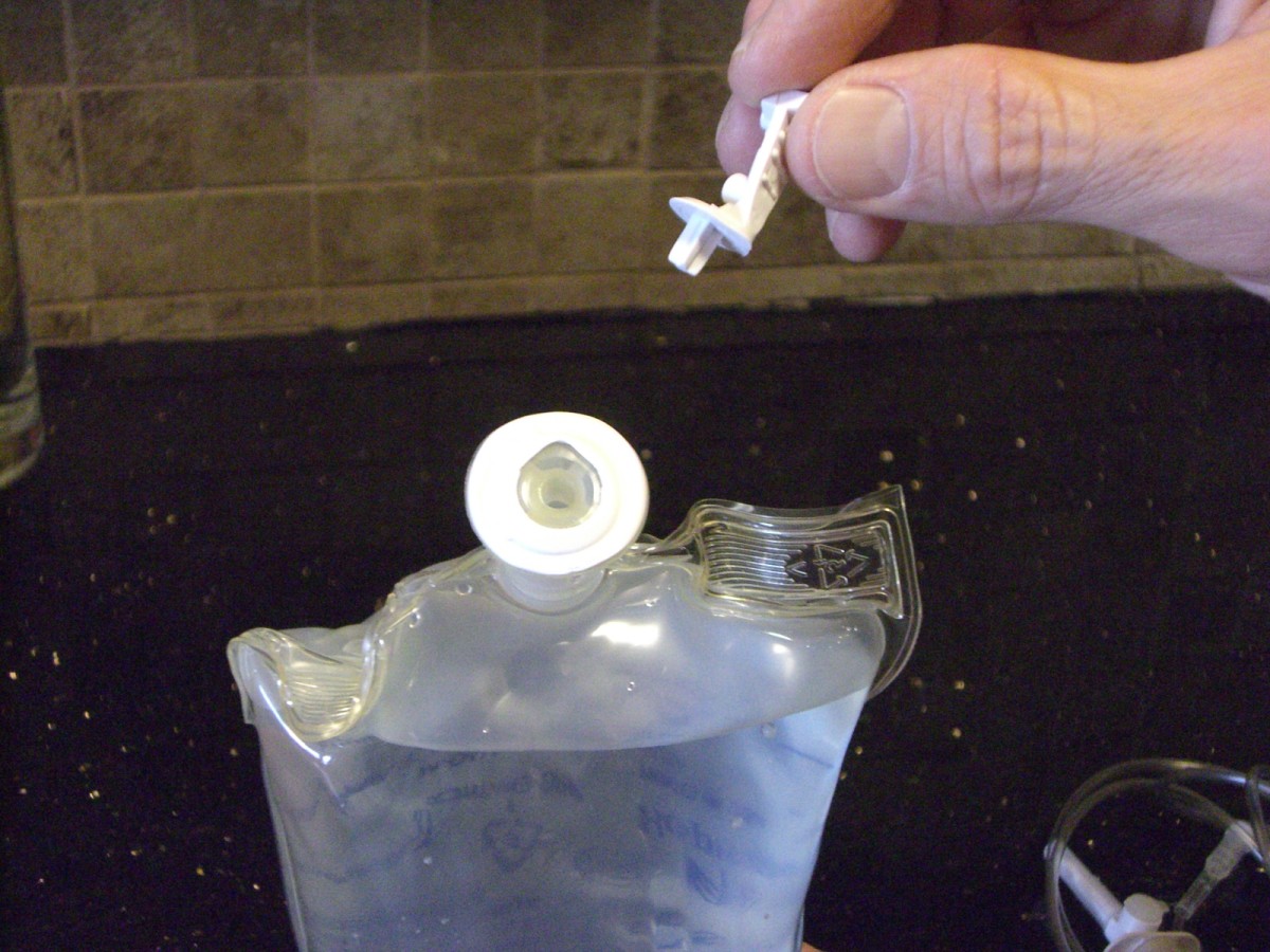 Remove the seal with the flap at the bottom of the bag while the bag is facing upward.