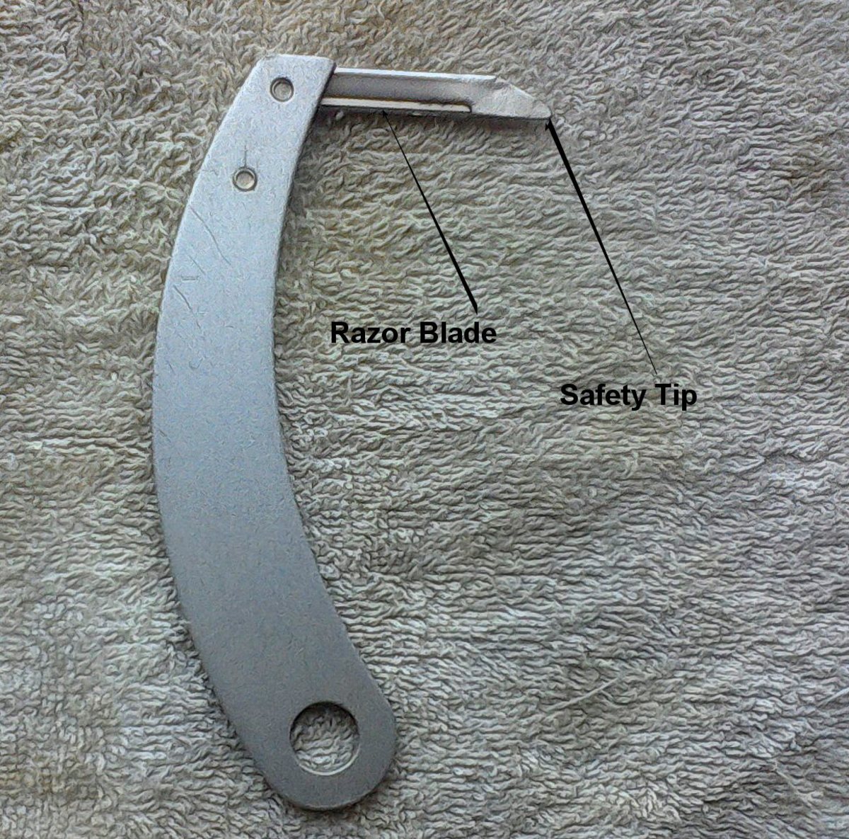 The splitter is a great aid in cutting those large knots into smaller, easier to remove knots. The razor blade can be changed when dull.