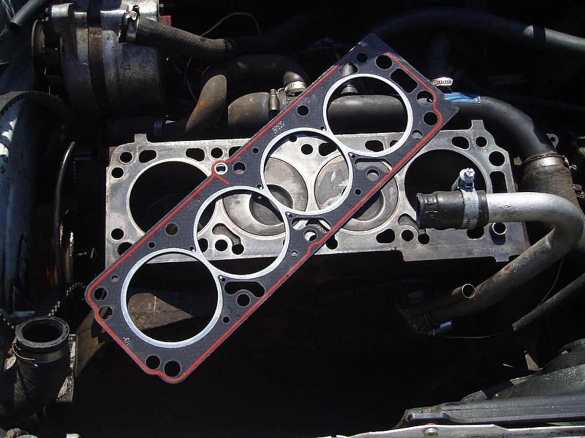 Check and replace the head gasket if blown.
