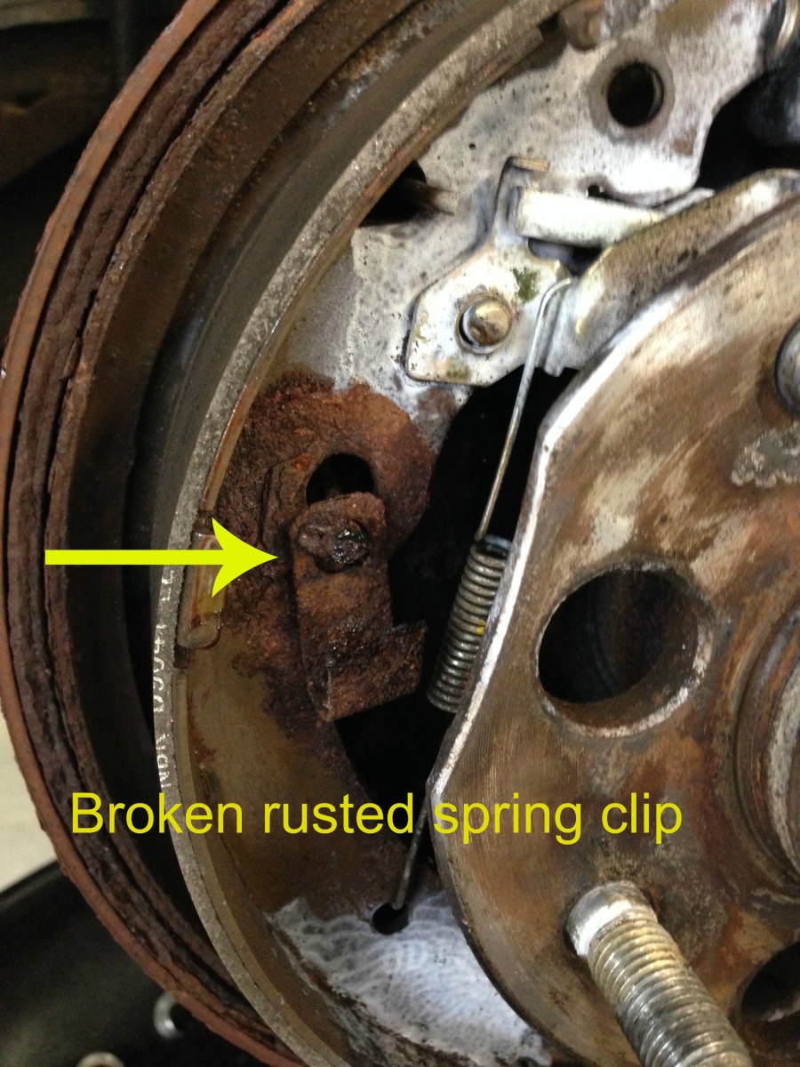 This is a broken hold-down pin for the rear brake shoes. 