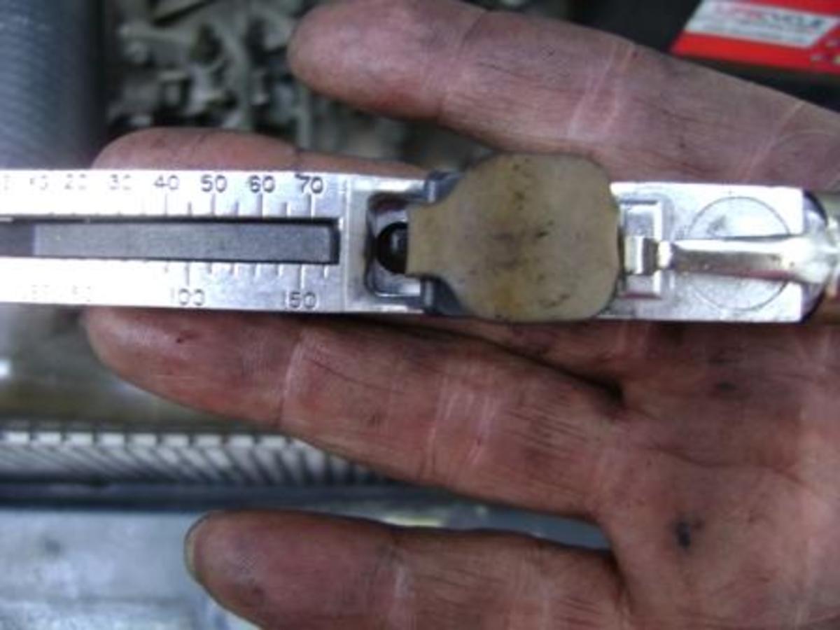 FF. Standard belt tension gauge