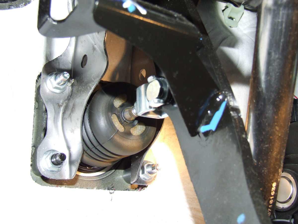 The master cylinder, where it attaches to the brake pedal. If the master cylinder is leaking externally, you will see fluid dripping from the place where the rod goes into the cylinder.