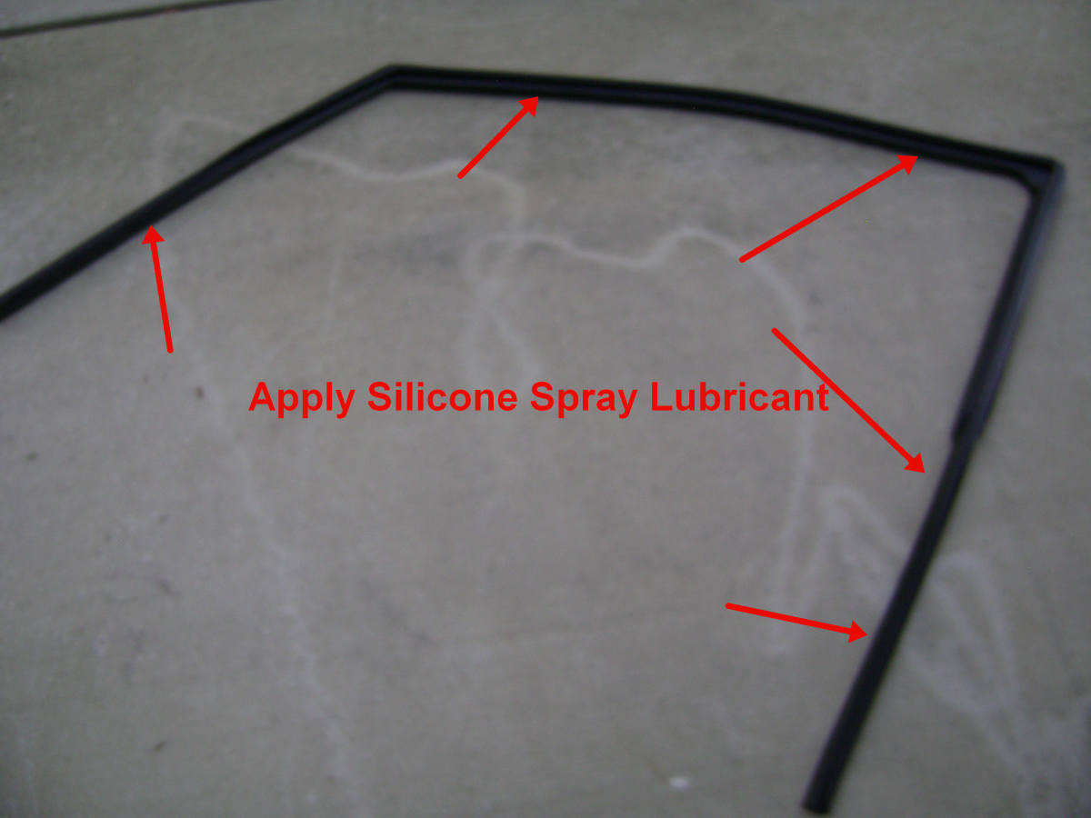 h. Apply silicone spray lubricant to the new rubber window guide.