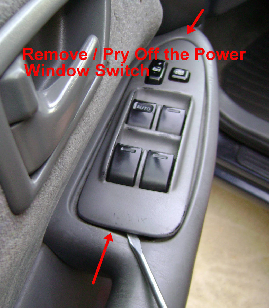 a. Pry off the Power Window Switch