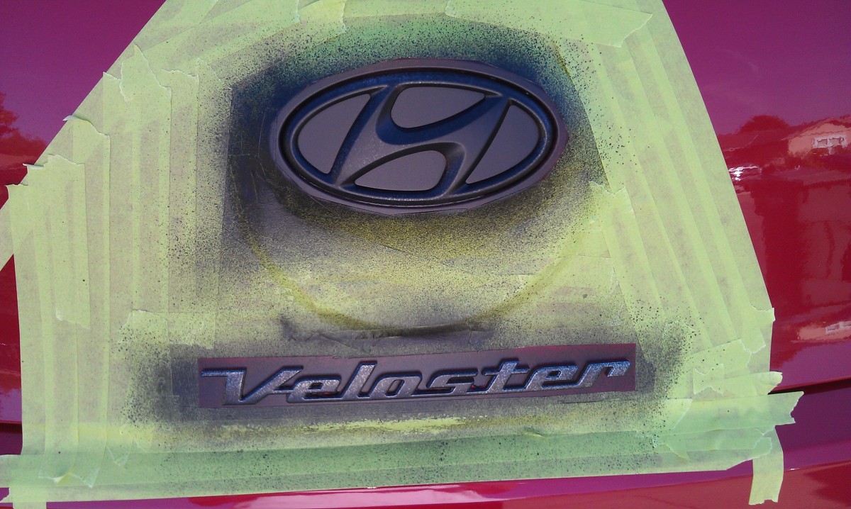 Masking off the emblem of a Hyundai Veloster