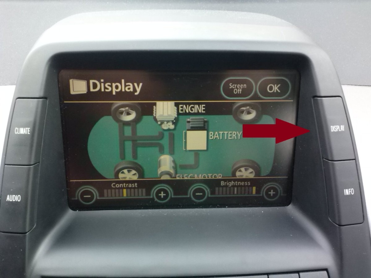 Once the MFD has booted up, press the "Display" button (red arrow) once. 