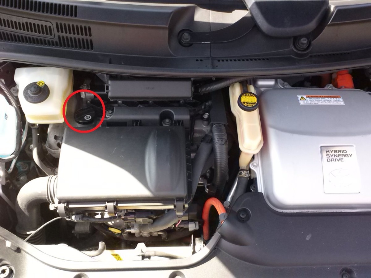 Location of oil fill cap, view of open engine bay from front of vehicle