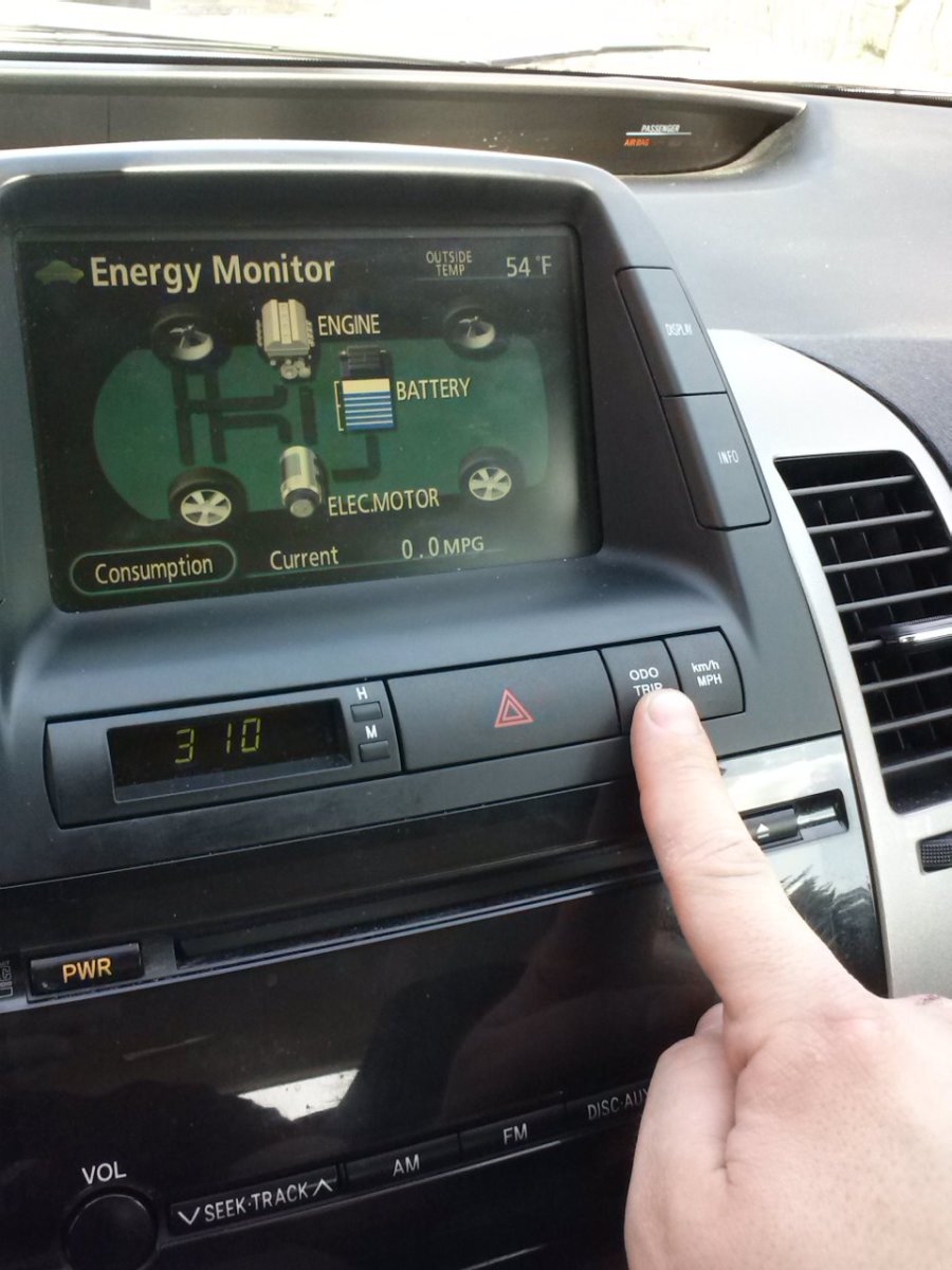 The location of the ODO/Trip button below the multi-function display.