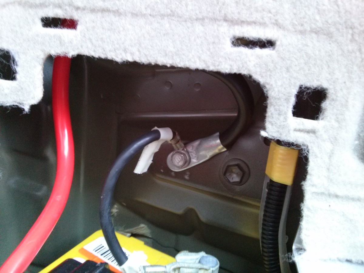 Connect the negative power cable where the negative from the battery connects to the body of the vehicle.