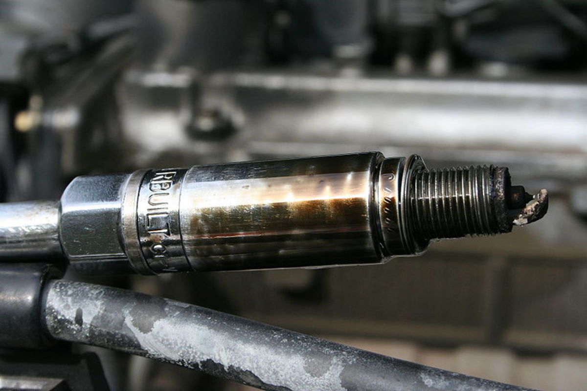 Remove and install spark plugs using a spark plug socket.