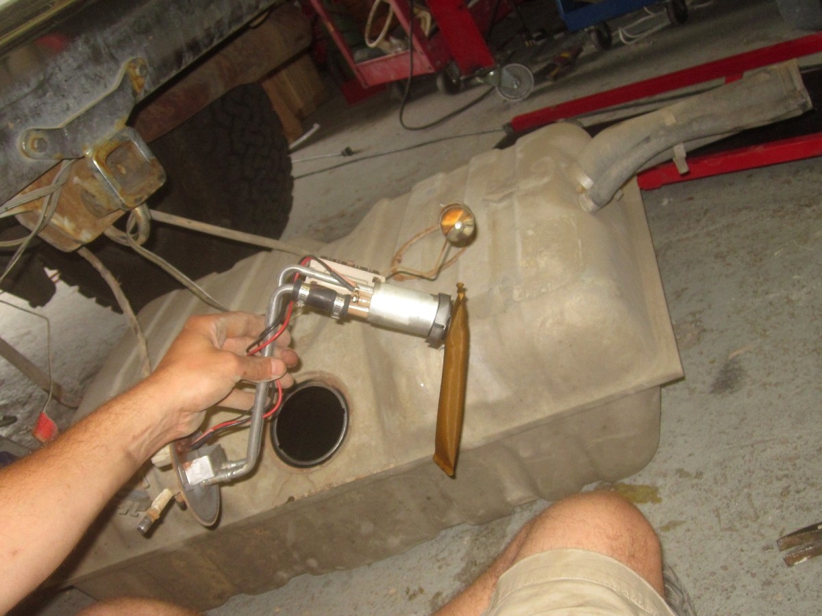 Removing the fuel pump assembly from the fuel tank.