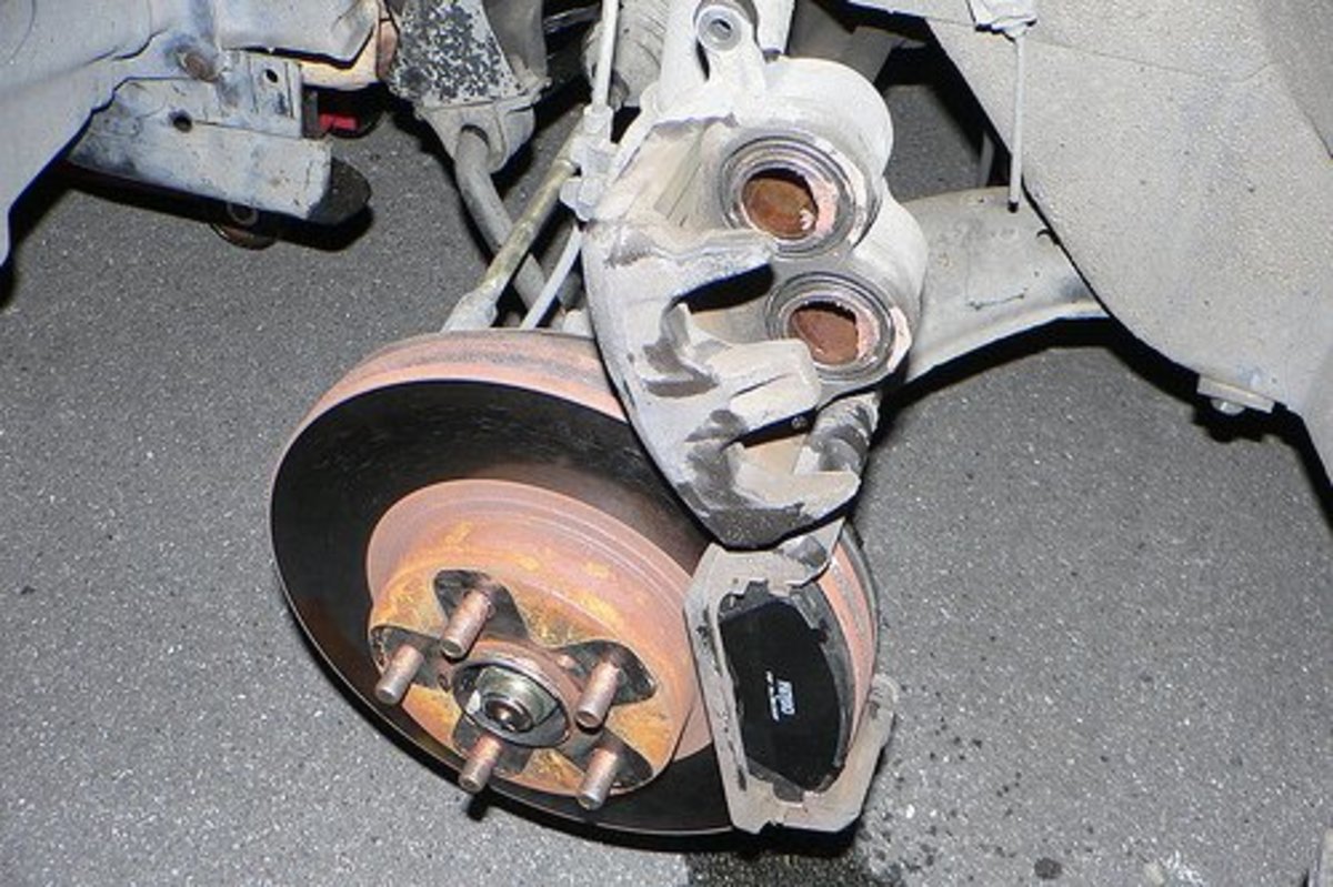 Check brake pads for contamination.