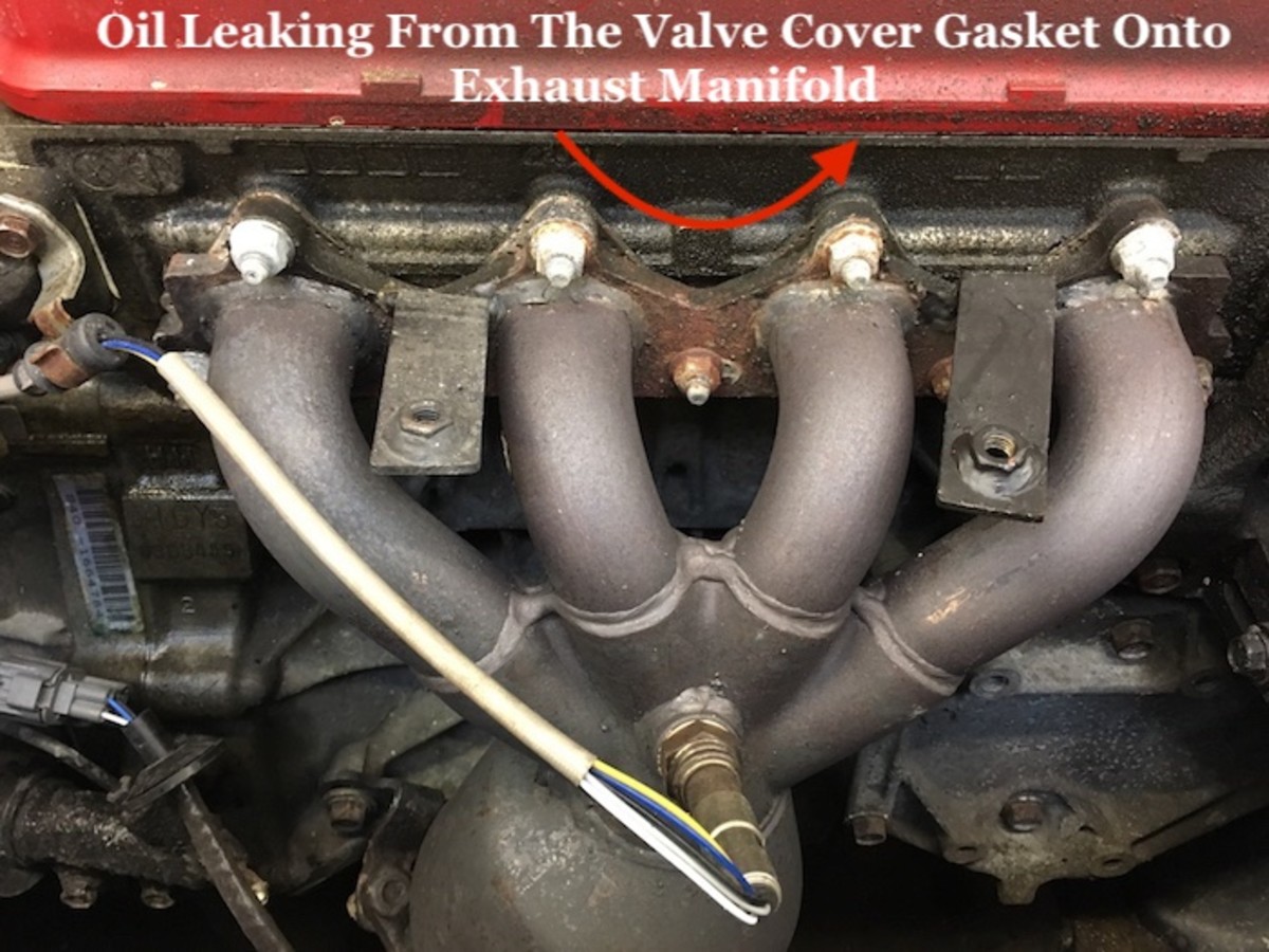 The exhaust manifold is located right under the valve cover gasket. If this gasket fails, oil will drip onto the exhaust and cause a gas smell inside the car. 