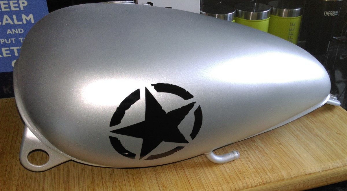 Tank sprayed silver with star decal on