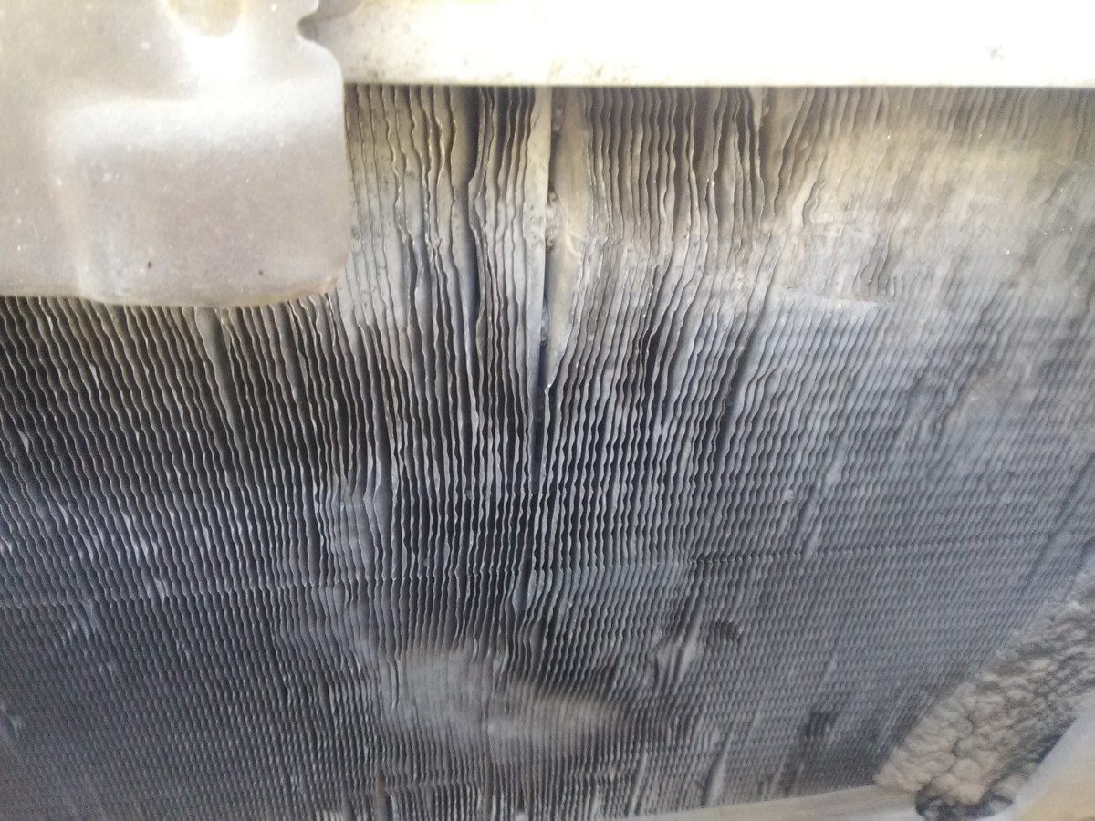 Check the condenser core for debris and bent fins that may disrupt AC proper operation.