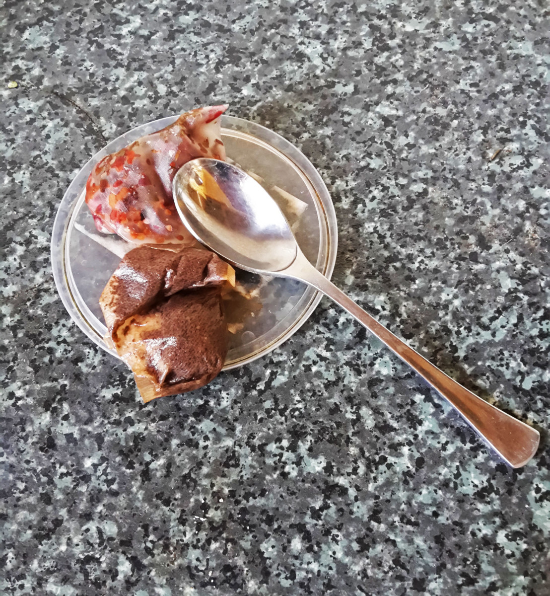 Plastic lids make great spoon rests.