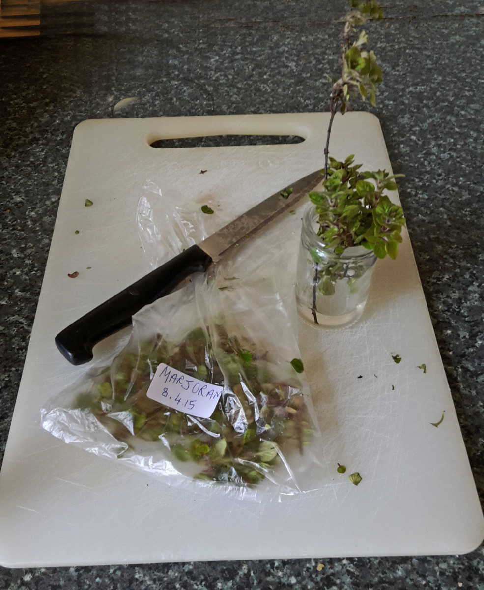 Chop and freeze your herbs.