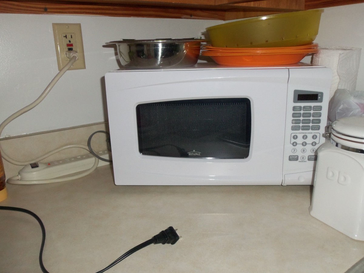 I just turned off the surge supressor (to the left of the microwave) and saved a ton on my electric bill.
