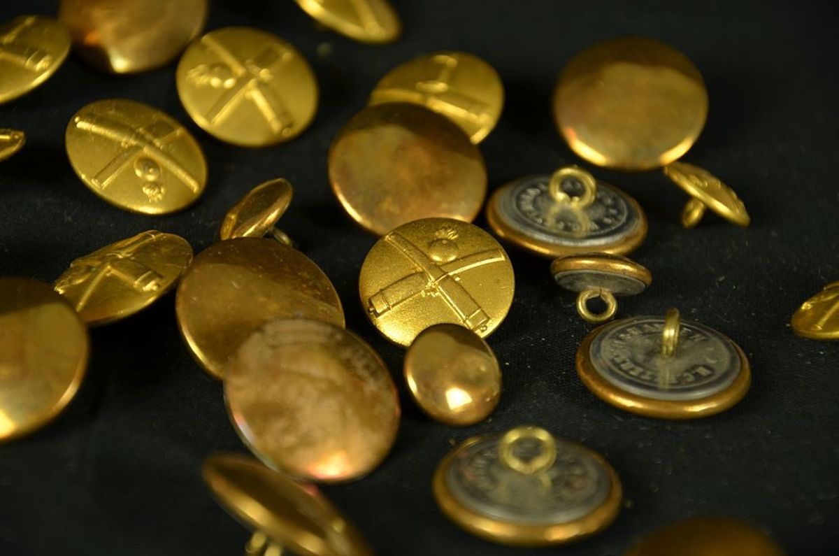 Brass buttons from the uniform of a Danish World War I artillery lieutenant. To this day many military uniforms have brass buttons. Cufflinks also are a good source of brass.