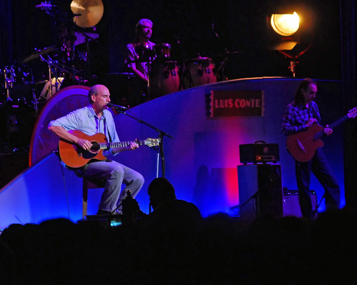 James Taylor on stage performing at Tanglewood. 