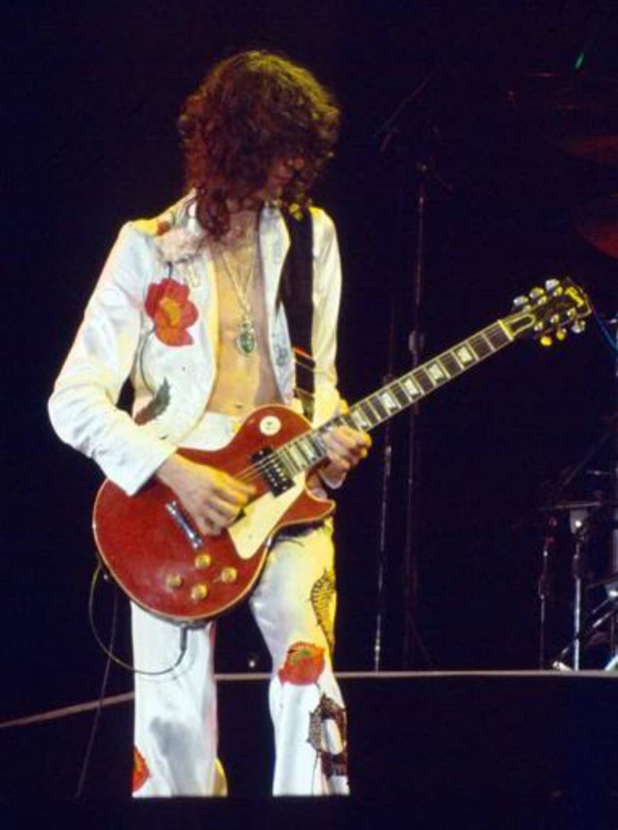 Jimmy Page and a cherry red Les Paul (only used in Led Zeppelin's 1977 tour).