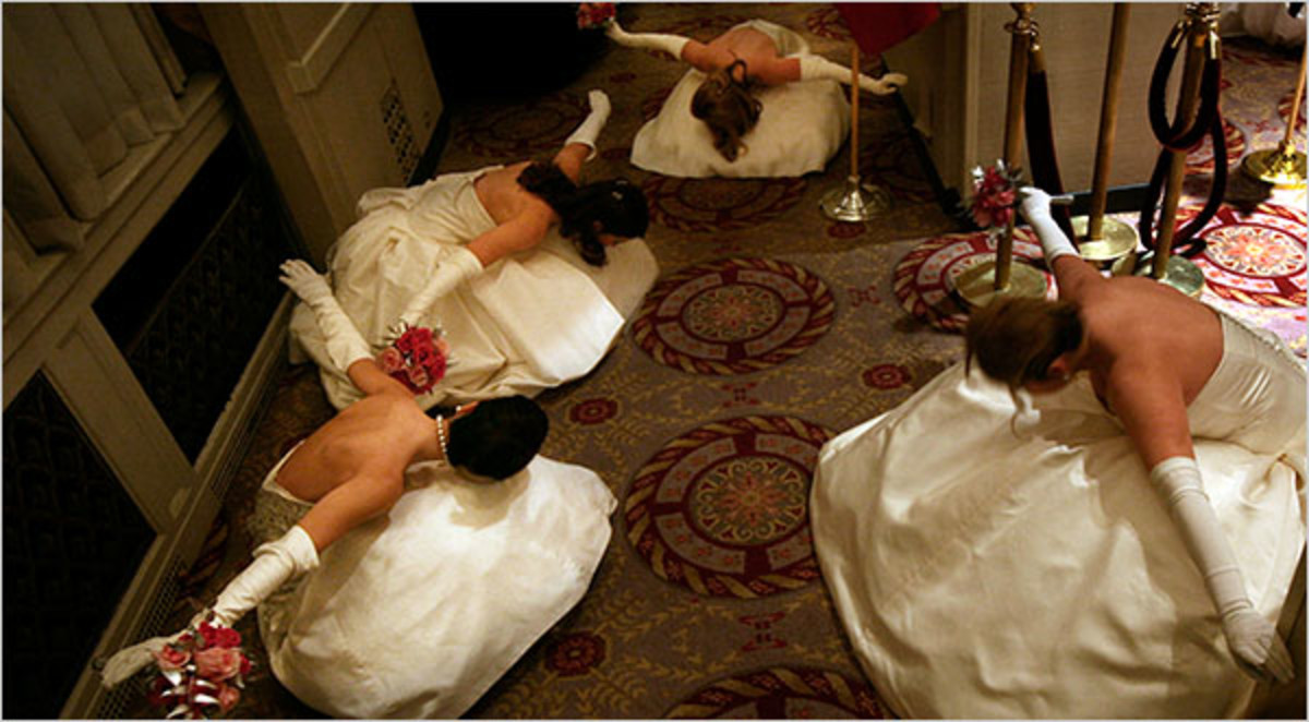 Debutantes practice the low curtsy called the "Texas Dip" before their debut at the Waldorf-Astoria.