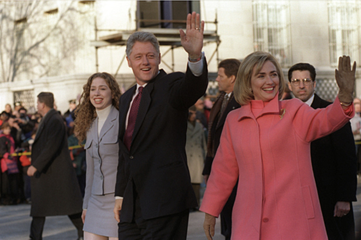 Bill, Hillary, and Chelsea Clinton enjoy inaguration day 1997.  Clinton served as the 42nd President.  Despite the Monica Lewinsky affair, Clinton famously left office with the highest public approval rating of any post-WWII President.