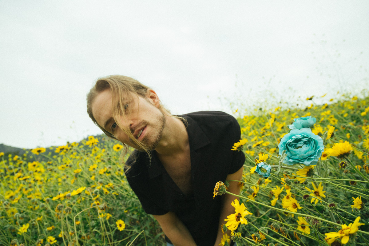 Bryce Avary, the Rocket Summer and a field of flowers. 