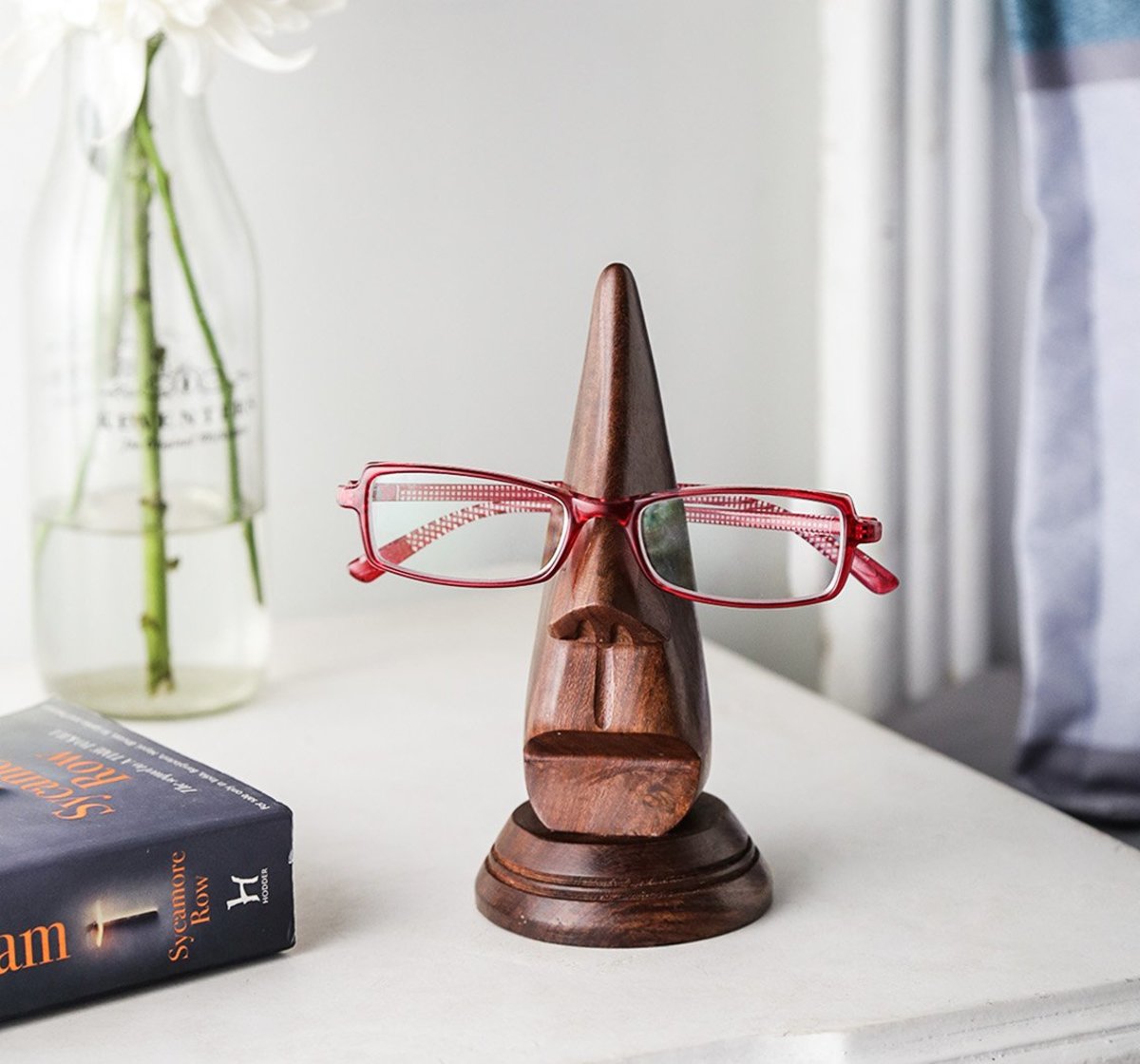 Unique eyeglass holder that would make a nice gift for people who have everything. 