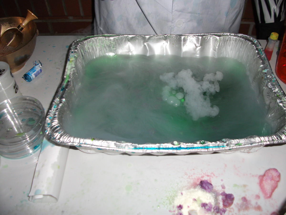 Spooky bubbling concoction made with baking soda, lemon juice, green food coloring, and dry ice.
