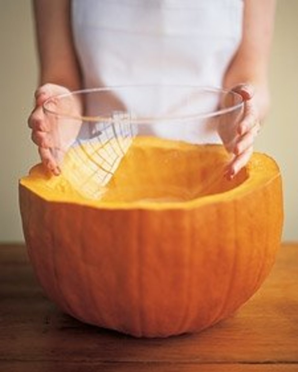 Preparing a pumpkin ice bucket with a bowl