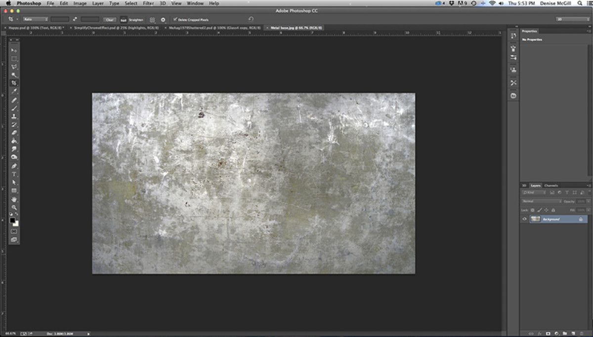 Place a rough metal texture photo background on the first layer. 